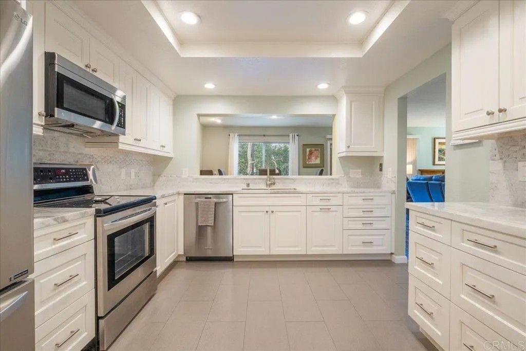 Photo of 6552 Corte Valdez, Carlsbad, CA 92009 (MLS # NDP2601528)