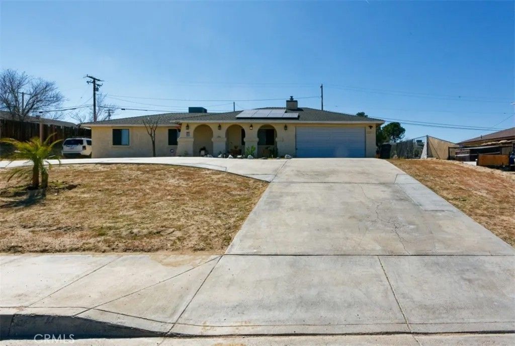 Photo of 15928 Village Drive, Victorville, CA 92394 (MLS # HD26054210)