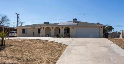 Photo of 15928 Village Drive, Victorville, CA 92394 (MLS # HD26054210)