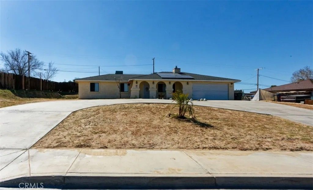Photo of 15928 Village Drive, Victorville, CA 92394 (MLS # HD26054210)