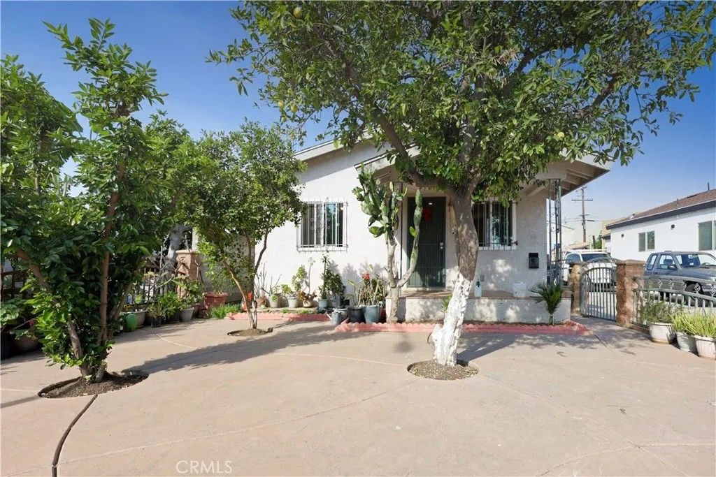 Photo of 6249 Hollenbeck St, Huntington Park, CA 90255 (MLS # DW26071464)