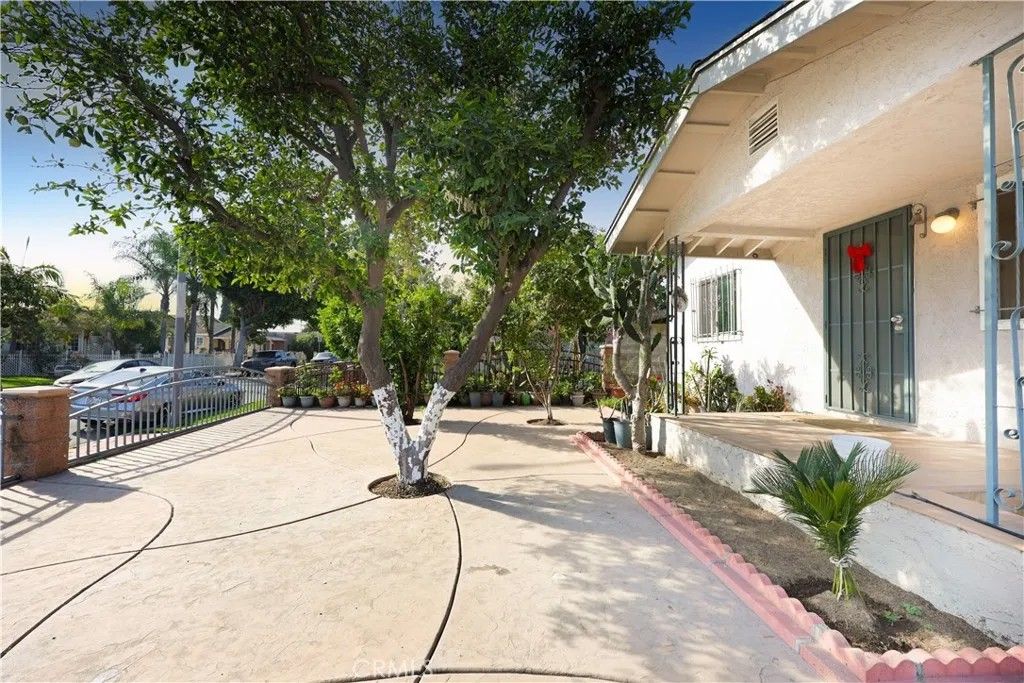 Photo of 6249 Hollenbeck St, Huntington Park, CA 90255 (MLS # DW26071464)