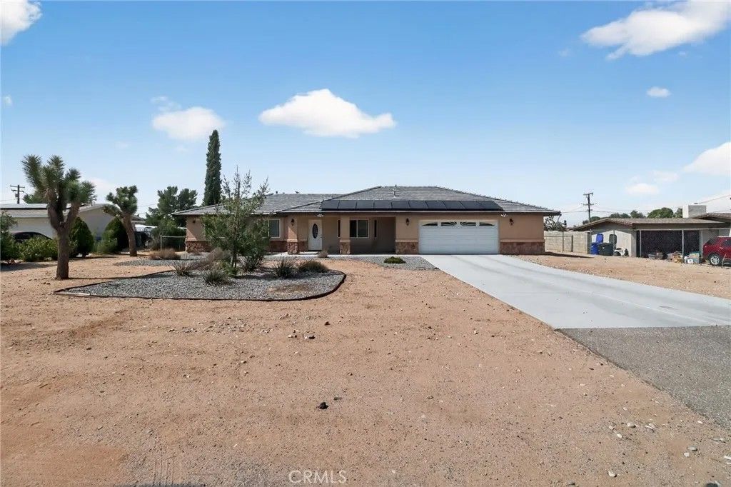 Photo of 20726 Nisqually Rd, Apple Valley, CA 92308 (MLS # IG26000430)