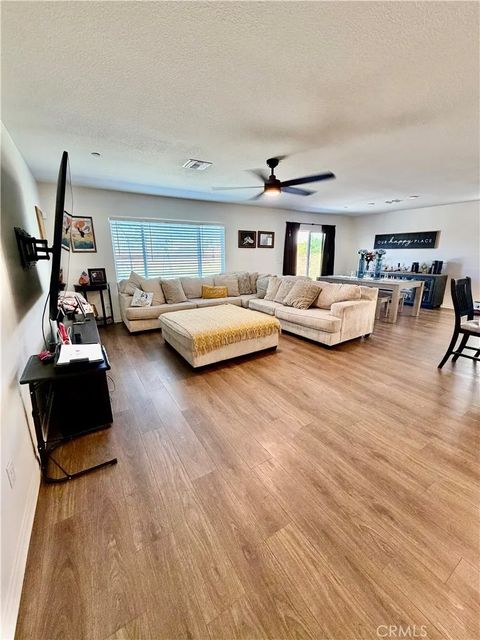 Photo of 25371 Sedona Ln, Homeland, CA 92548 (MLS # CV26056671)