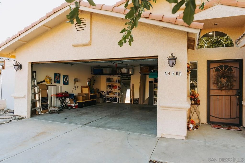 Photo of 54205 Avenida Alvarado, La Quinta, CA 92253 (MLS # 250043282)