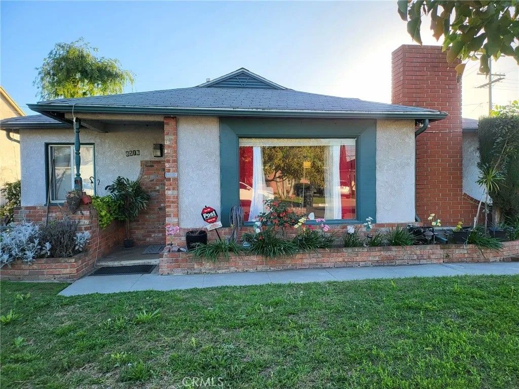 Photo of 8516 Lyndora St, Downey, CA 90242 (MLS # DW26009936)