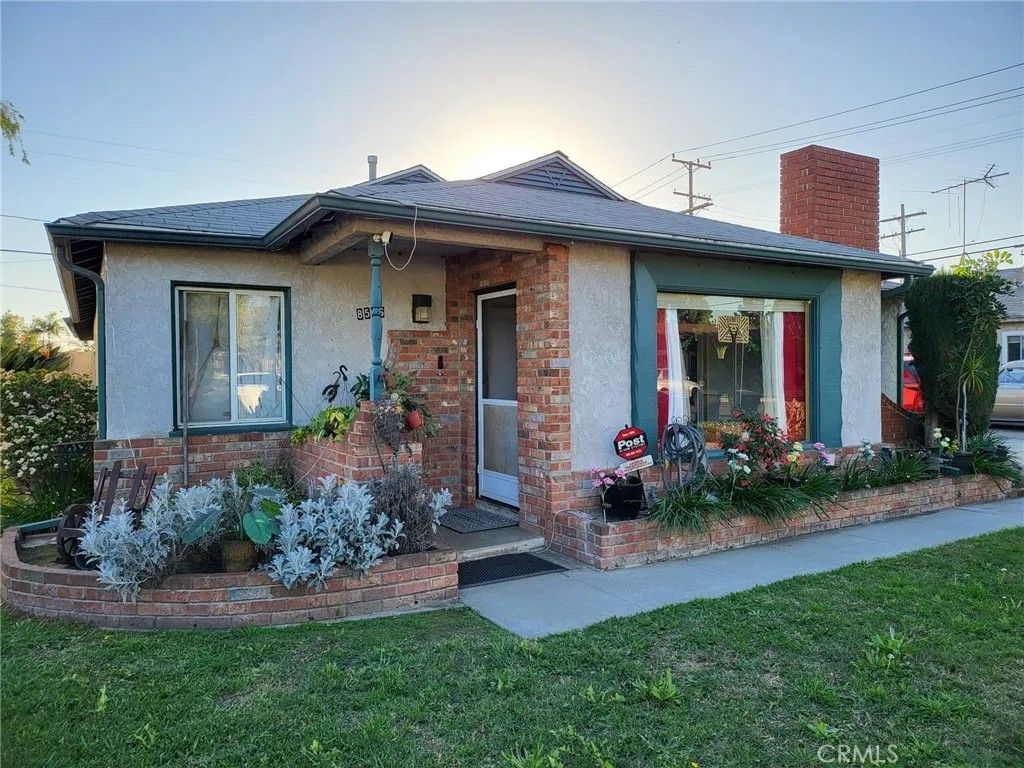 Photo of 8516 Lyndora St, Downey, CA 90242 (MLS # DW26009936)