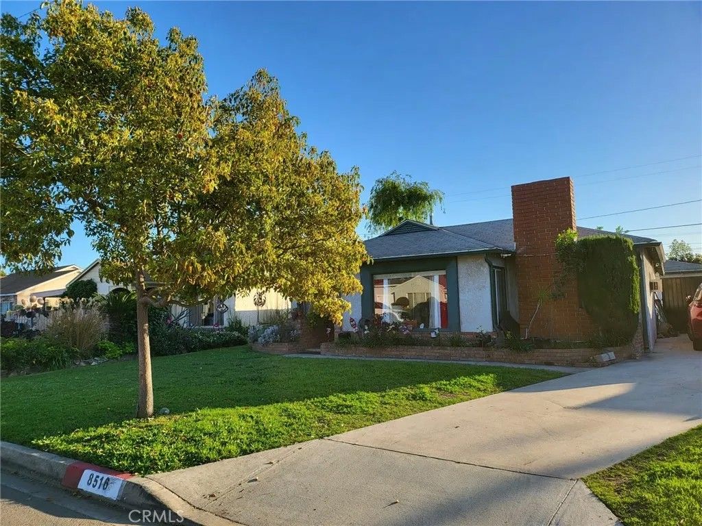 Photo of 8516 Lyndora St, Downey, CA 90242 (MLS # DW26009936)