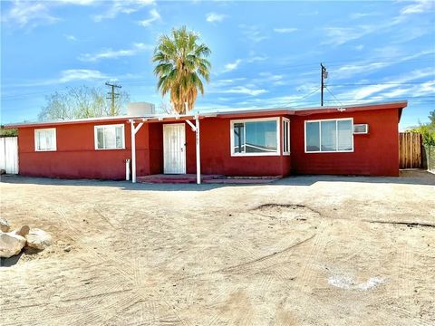 Photo of 74797 Serrano Dr, 29 Palms, CA 92277 (MLS # JT26051894)