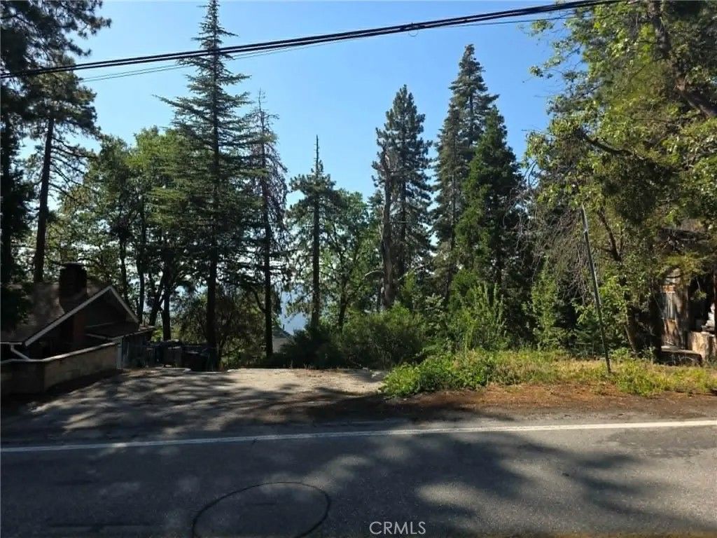 Photo of 30778 Live Oak Dr, Running Springs, CA 92382 (MLS # IV26103783)