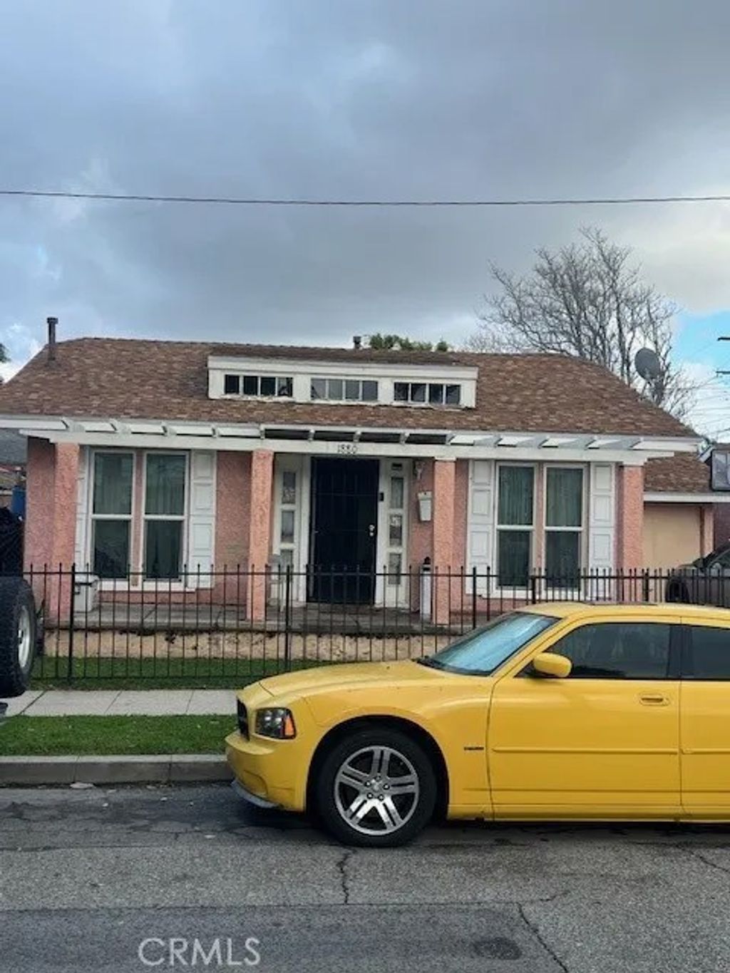 Photo of 1876 Myrtle Ave, Long Beach, CA 90806 (MLS # PW26038156)