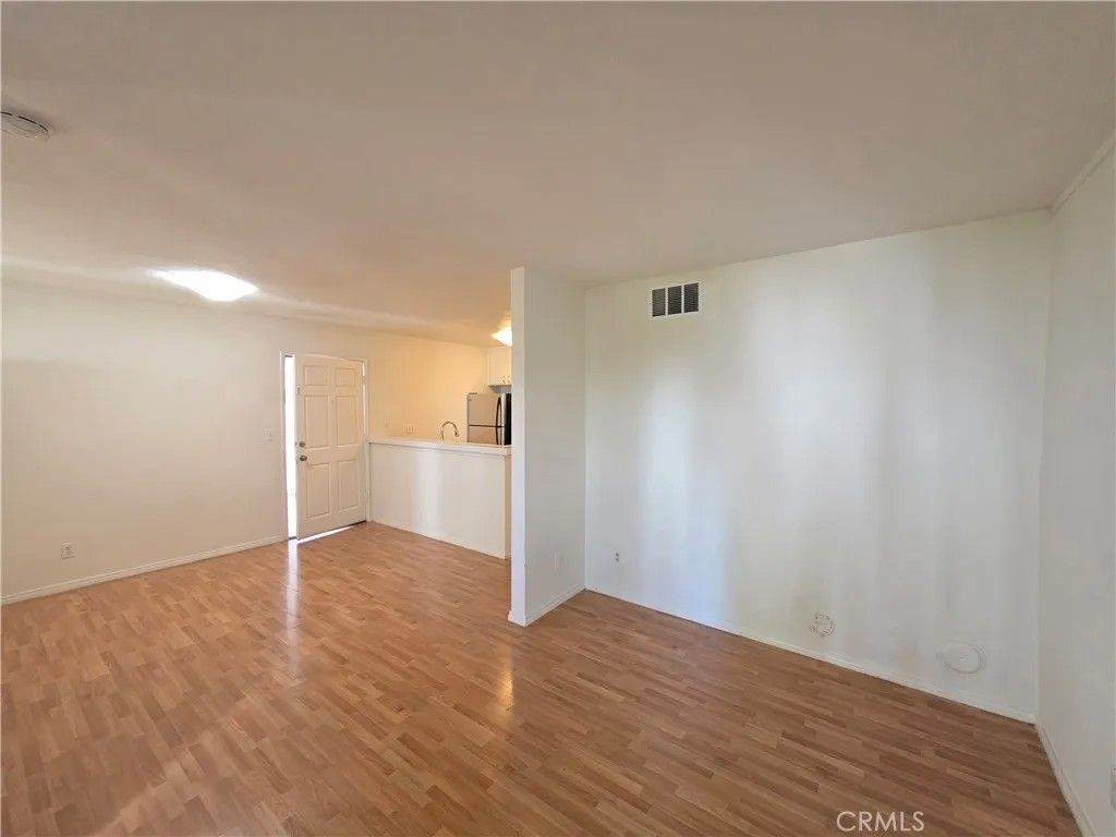 Photo of 18645 Hatteras St #111, Tarzana, CA 91356 (MLS # SR26091224)