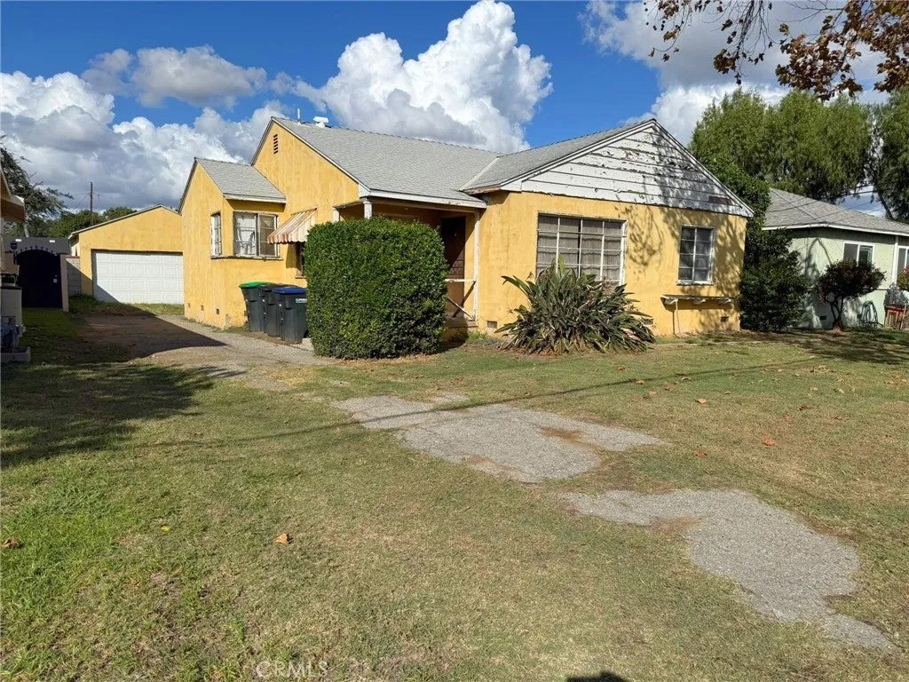 Photo of 9153 Rendalia Street, Bellflower, CA 90706 (MLS # PW26226025)