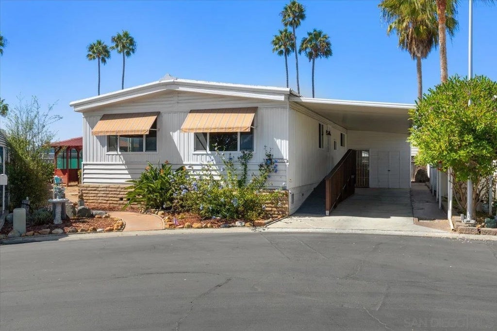 Photo of 7127 Santa Barbara St #113, Carlsbad, CA 92011 (MLS # 260021212)