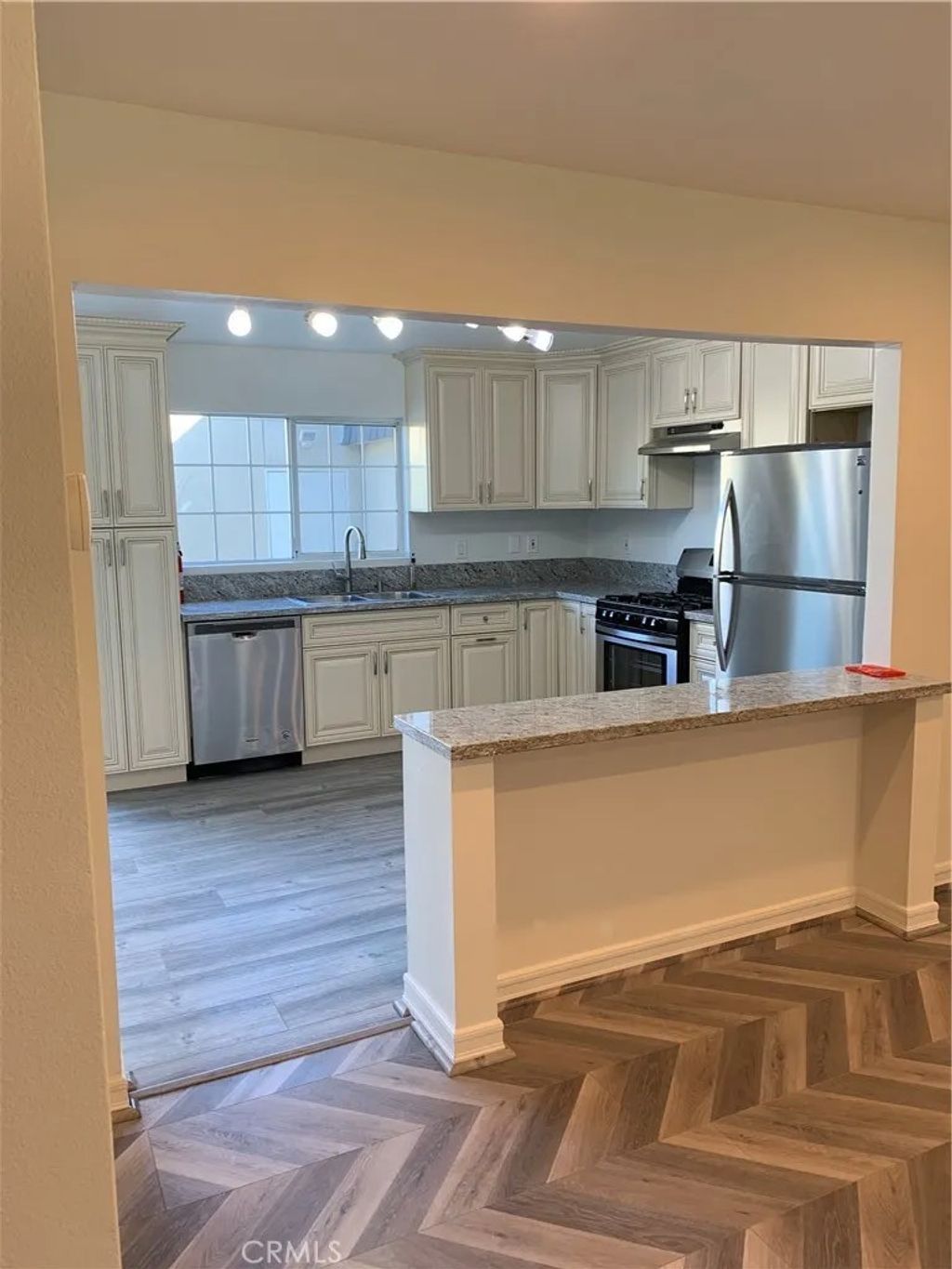 Photo of 19234 Hamlin St, Reseda, CA 91335 (MLS # SR26000272)