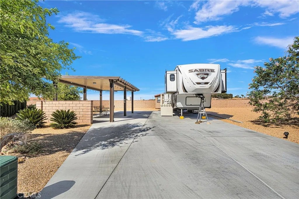 Photo of 19342 Birdie Way, Apple Valley, CA 92308 (MLS # CV26206389)