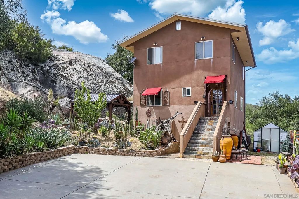 Photo of 20841 Deerhorn Valley Rd, Jamul, CA 91935 (MLS # 260010916)