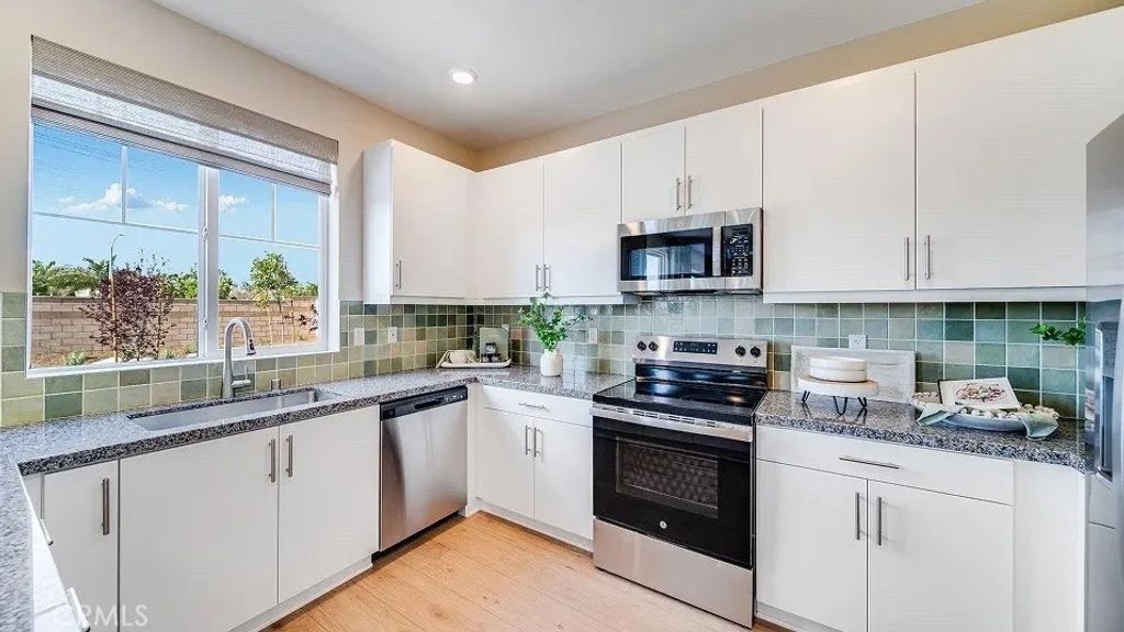 Photo of 27267 Sitar Circle, Menifee, CA 92586 (MLS # SW26084250)