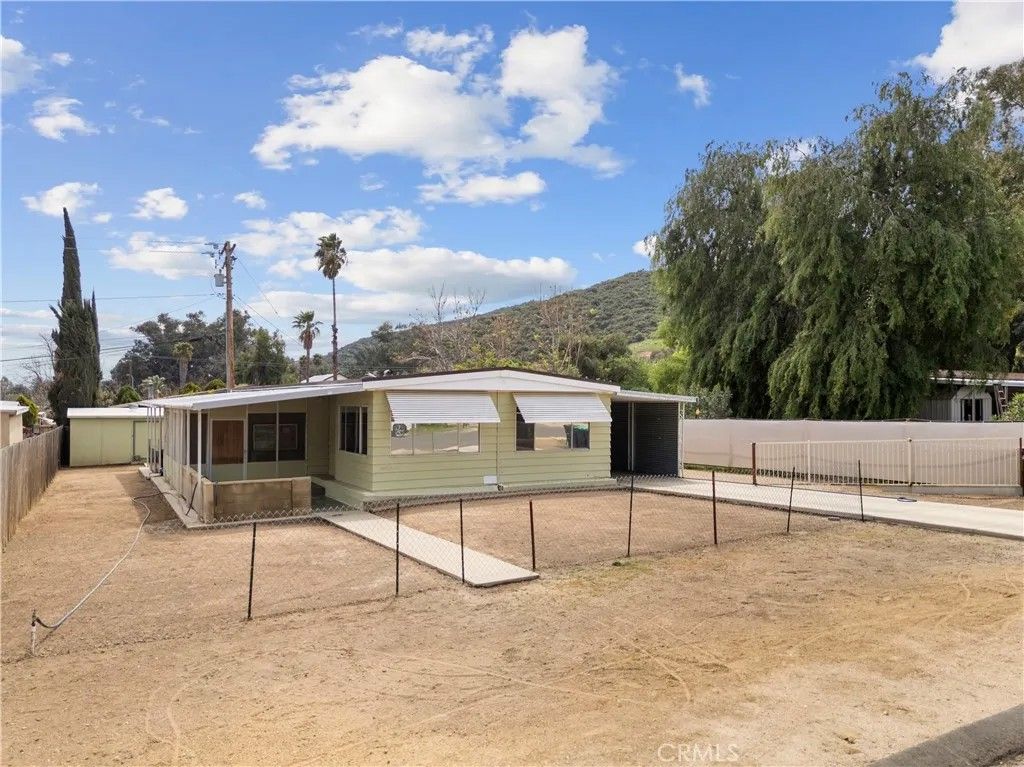 Photo of 33124 Arbolado Lane, Lake Elsinore, CA 92530 (MLS # SW25269258)