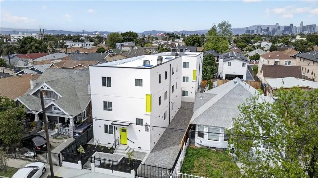 Photo of 283 E 50th St, Los Angeles, CA 90011 (MLS # DW26083711)