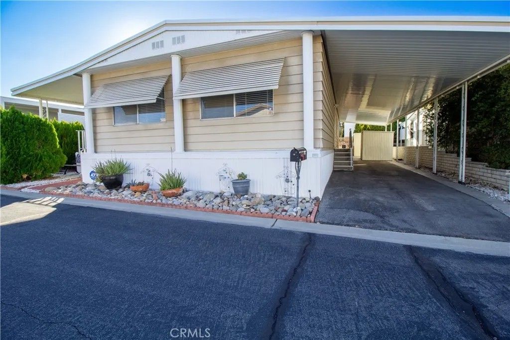 Photo of 54999 Martinez Trl #87, Yucca Valley, CA 92240 (MLS # IG25266787)