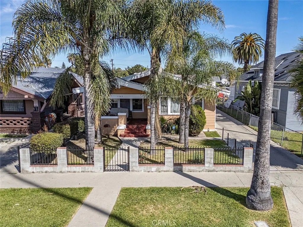 Photo of 1565 W 51st St, Los Angeles, CA 90062 (MLS # PW26082298)