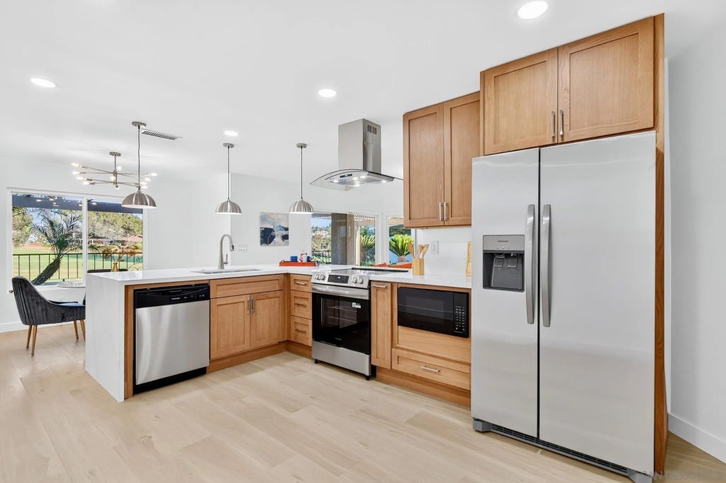 Photo of 12843 Camino Ramillette, San Diego, CA 92128 (MLS # 260025146)