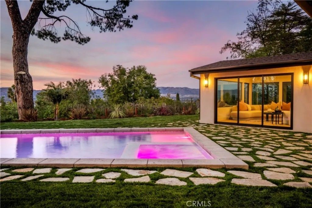 Photo of 20553 Califa, Woodland Hills, CA 91367 (MLS # SR25273510)