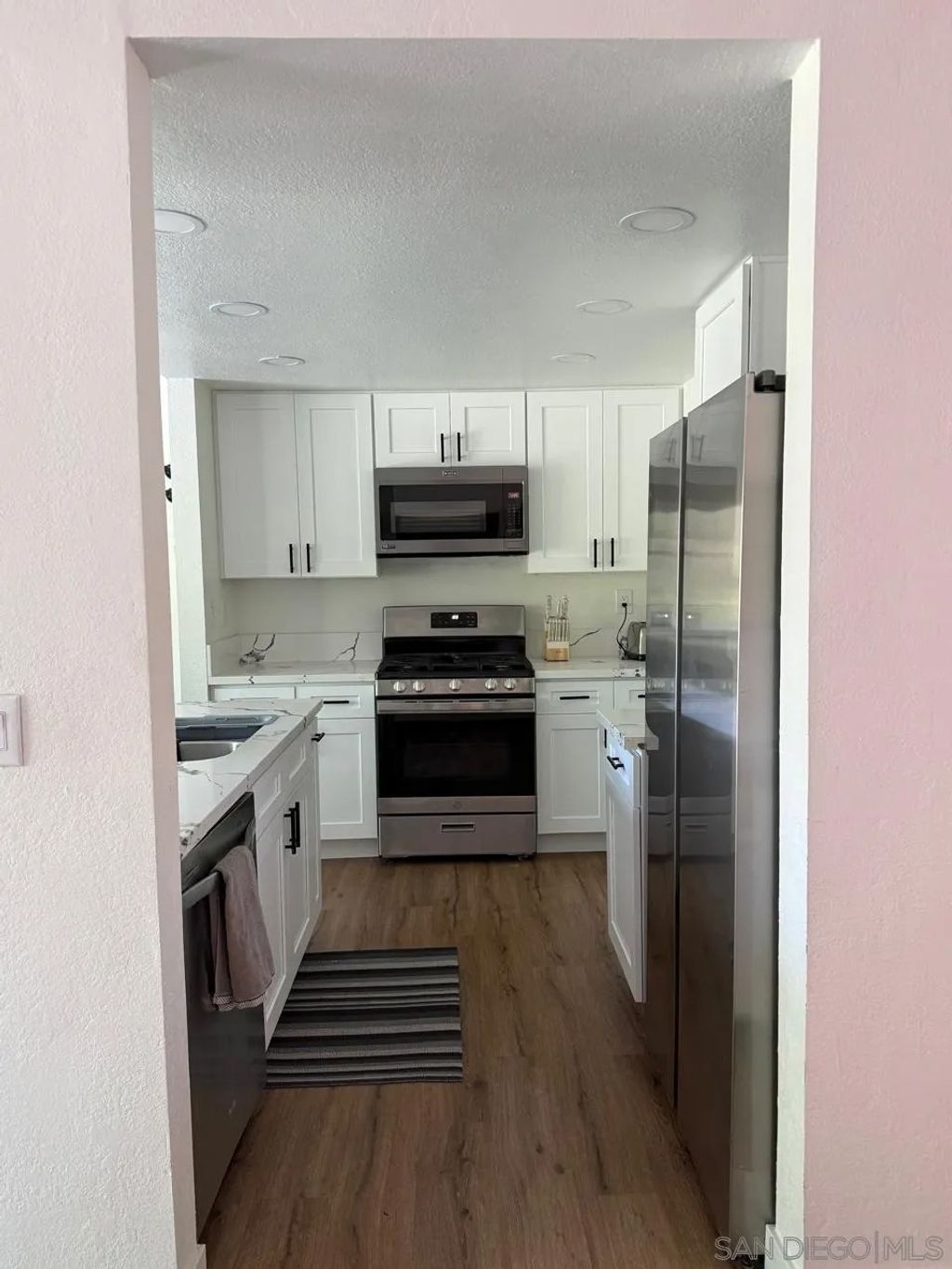 Photo of 6968 Camino Amero, San Diego, CA 92111 (MLS # 260006175)