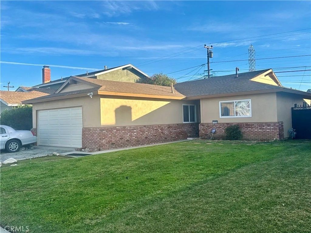 Photo of 15520 S Mckinley Ave, Compton, CA 90220 (MLS # PW26007658)