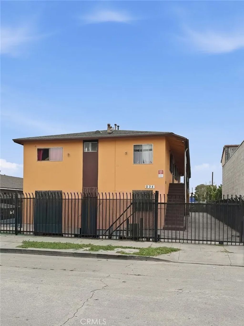 Photo of 235 E 87th Street, Los Angeles, CA 90003 (MLS # HD26039238)