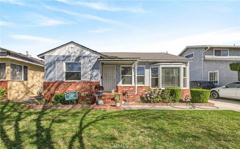 Photo of 6137 Greenmeadow Rd, Lakewood, CA 90713 (MLS # PW26056495)