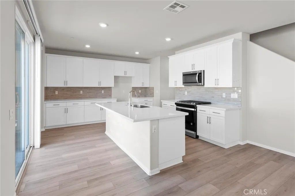 Photo of 19409 Brush Creek Way, Lake Elsinore, CA 92532 (MLS # IV25214512)