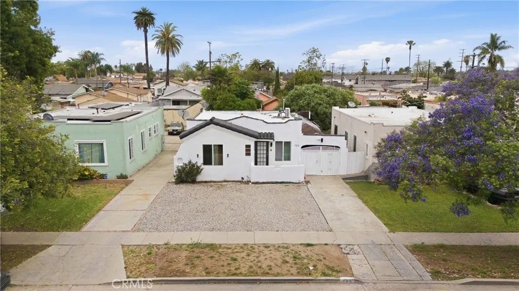 Photo of 725 W 107th St, Los Angeles, CA 90044 (MLS # PW26070439)