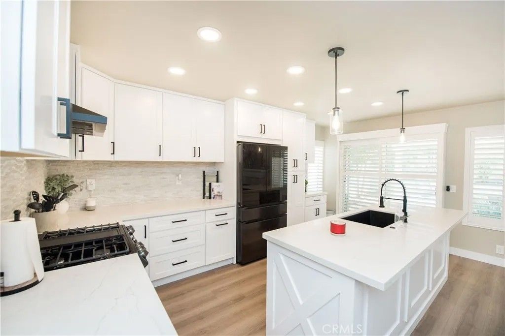 Photo of 11597 Norgate Drive, Corona, CA 92878 (MLS # IG26040871)