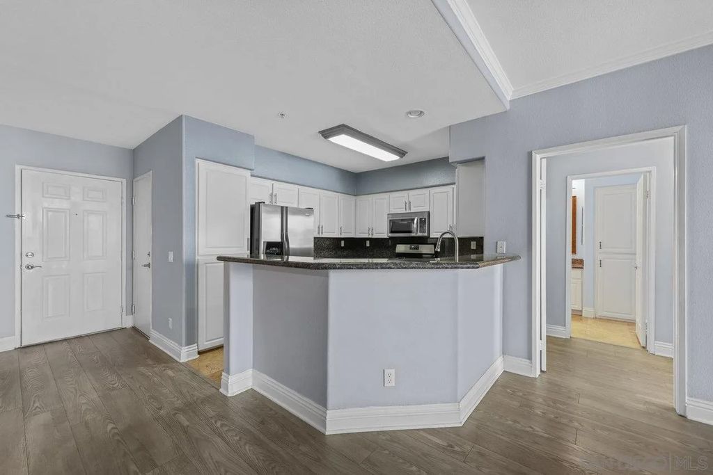 Photo of 12372 Carmel Country Rd #202, San Diego, CA 92130 (MLS # 250044660)