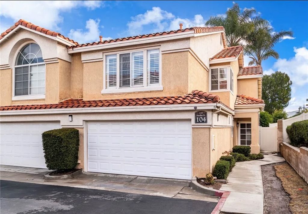 Photo of 1120 Portofino Court #104, Corona, CA 92881 (MLS # CV26004526)