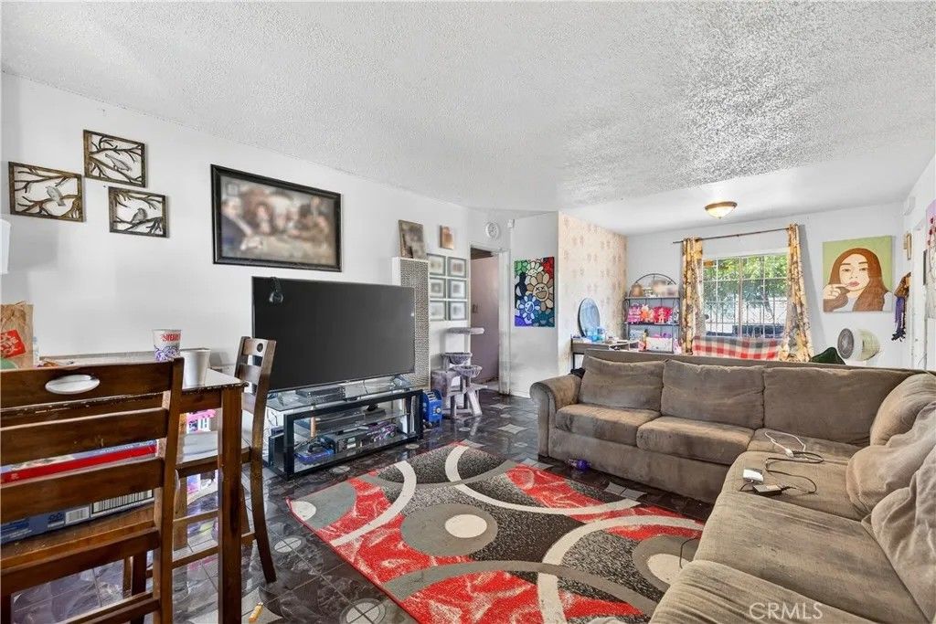 Photo of 705 S Thorson Avenue, Compton, CA 90221 (MLS # CV26051467)