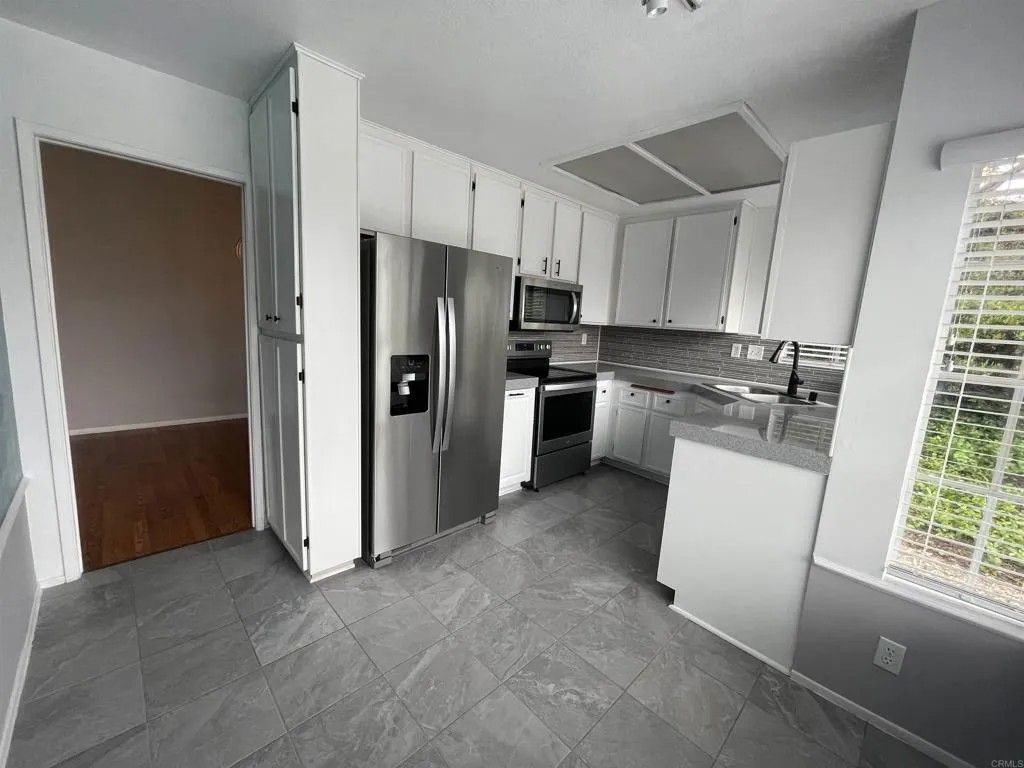 Photo of 1622 Camino Rociar, San Marcos, CA 92078 (MLS # NDP2509994)