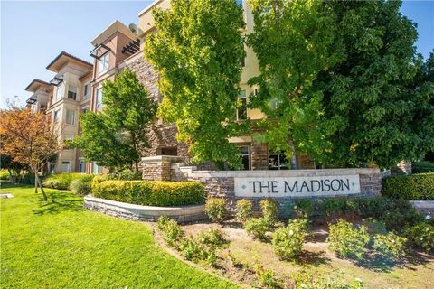 Photo of 24535 Town Center Dr #6203, Valencia, CA 91355 (MLS # SR25244692)