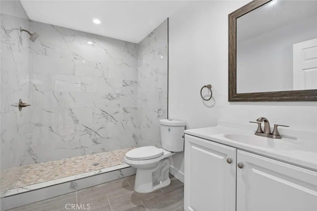 Photo of 6651 Millmark Ave #A, Long Beach, CA 90805 (MLS # CV26062175)