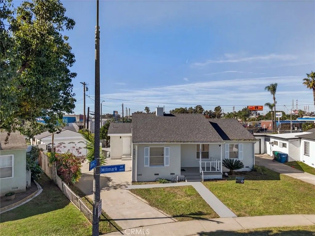 Photo of 6651 Millmark Ave #A, Long Beach, CA 90805 (MLS # CV26062175)