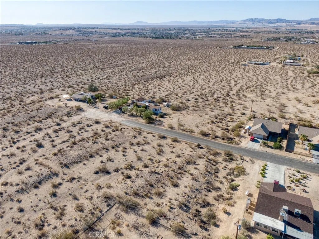 Photo of 74425 Twilight Dr, 29 Palms, CA 92277 (MLS # JT26184711)