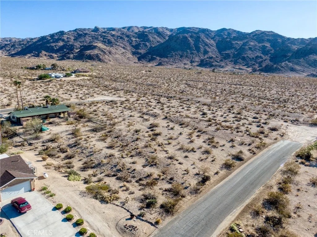 Photo of 74425 Twilight Dr, 29 Palms, CA 92277 (MLS # JT26184711)