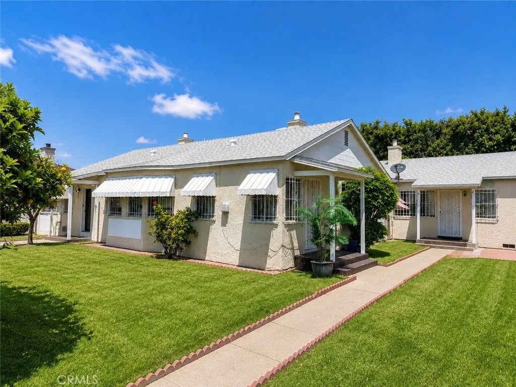 Photo of 1137 W Spruce ST, Compton, CA 90220 (MLS # RS26110771)