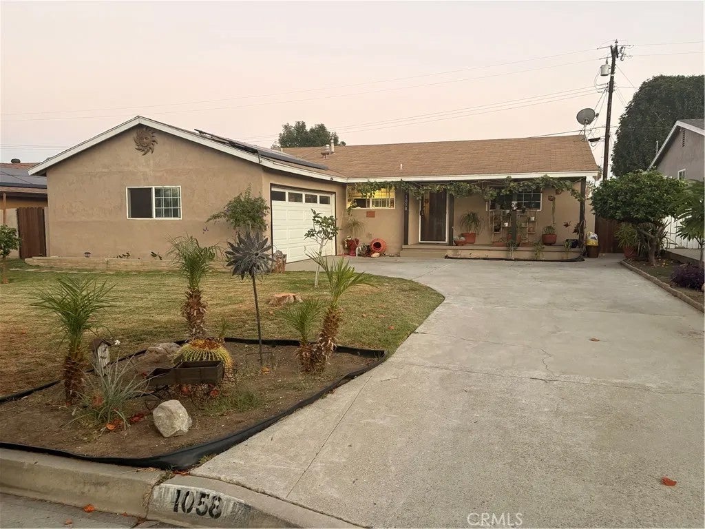 Photo of 1058 Doverfield AVE, Hacienda Heights, CA 91745 (MLS # DW26226338)