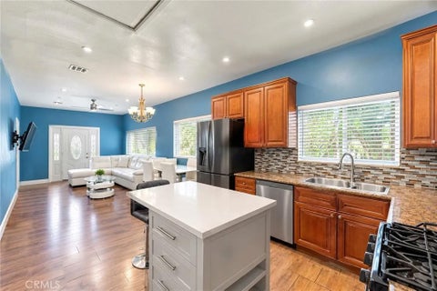 Photo of 1345 W 89th ST, Los Angeles, CA 90044 (MLS # DW26224516)