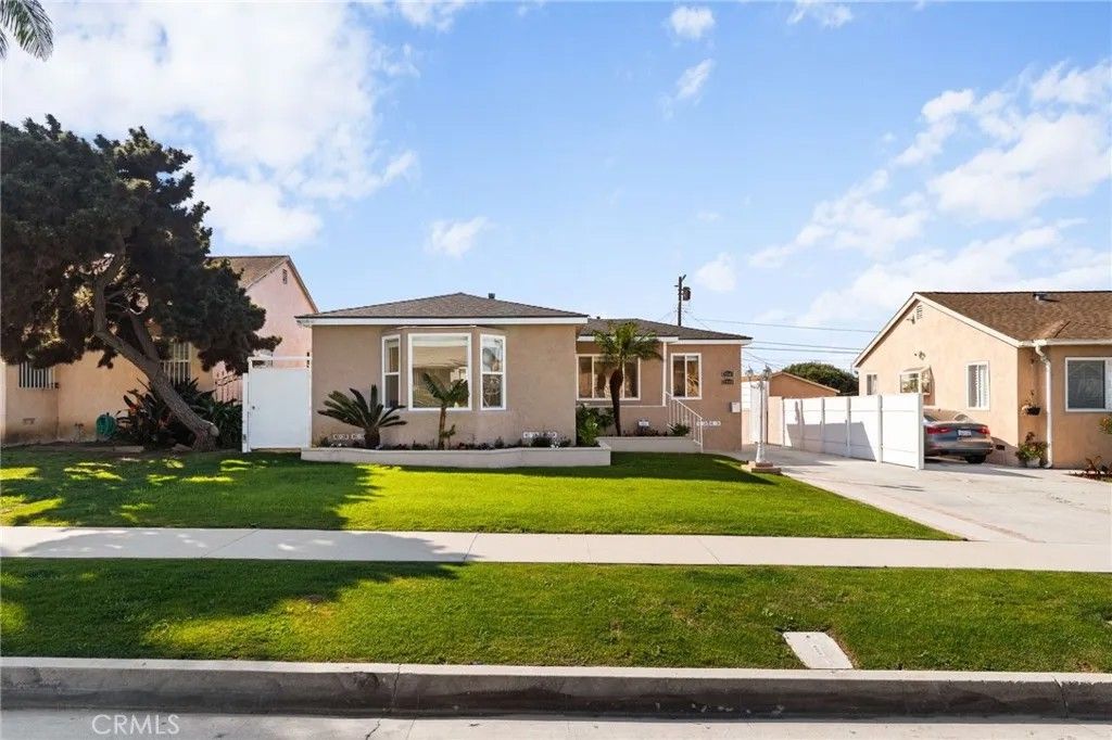 Photo of 2046 W 112th St, Los Angeles, CA 90047 (MLS # CV26059938)