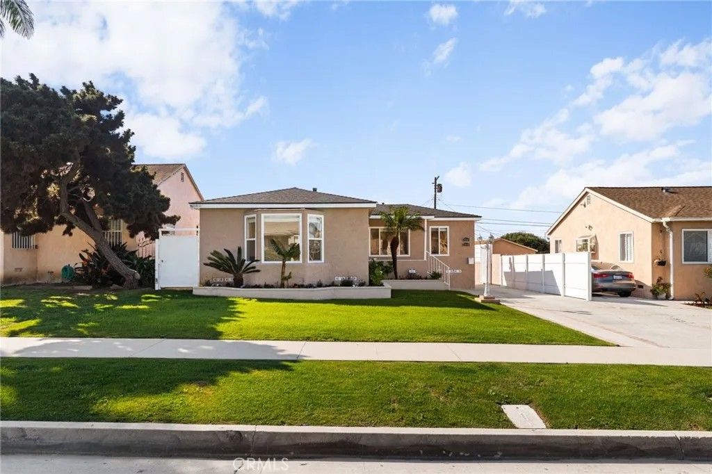 Photo of 2046 W 112th St, Los Angeles, CA 90047 (MLS # CV26059938)