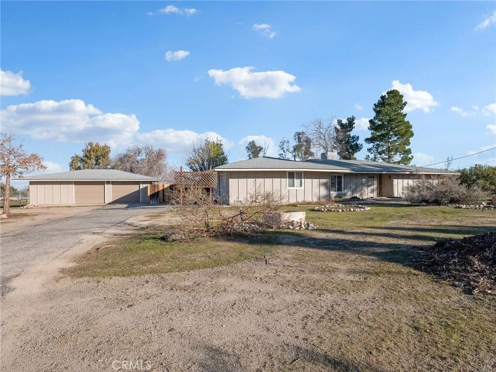 Photo of 10011 Alta Mesa Ave, Phelan, CA 92371 (MLS # HD26008231)